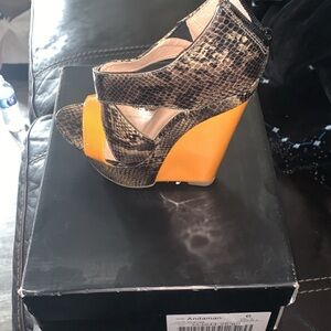 Snake print wedge heels